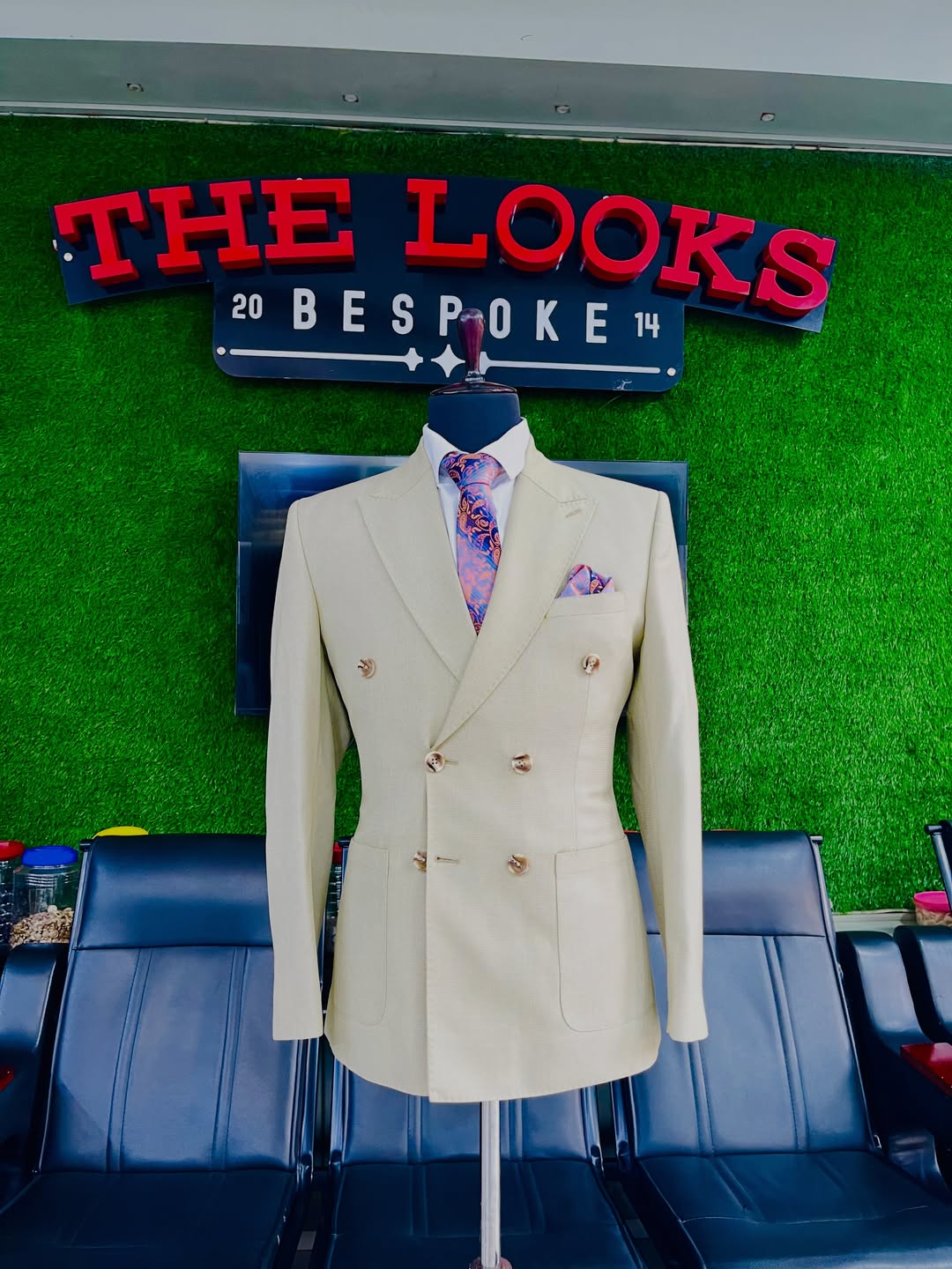 Bespoke suit on display at The Looks Bespoke showroom, Kampala (showroom look 1)