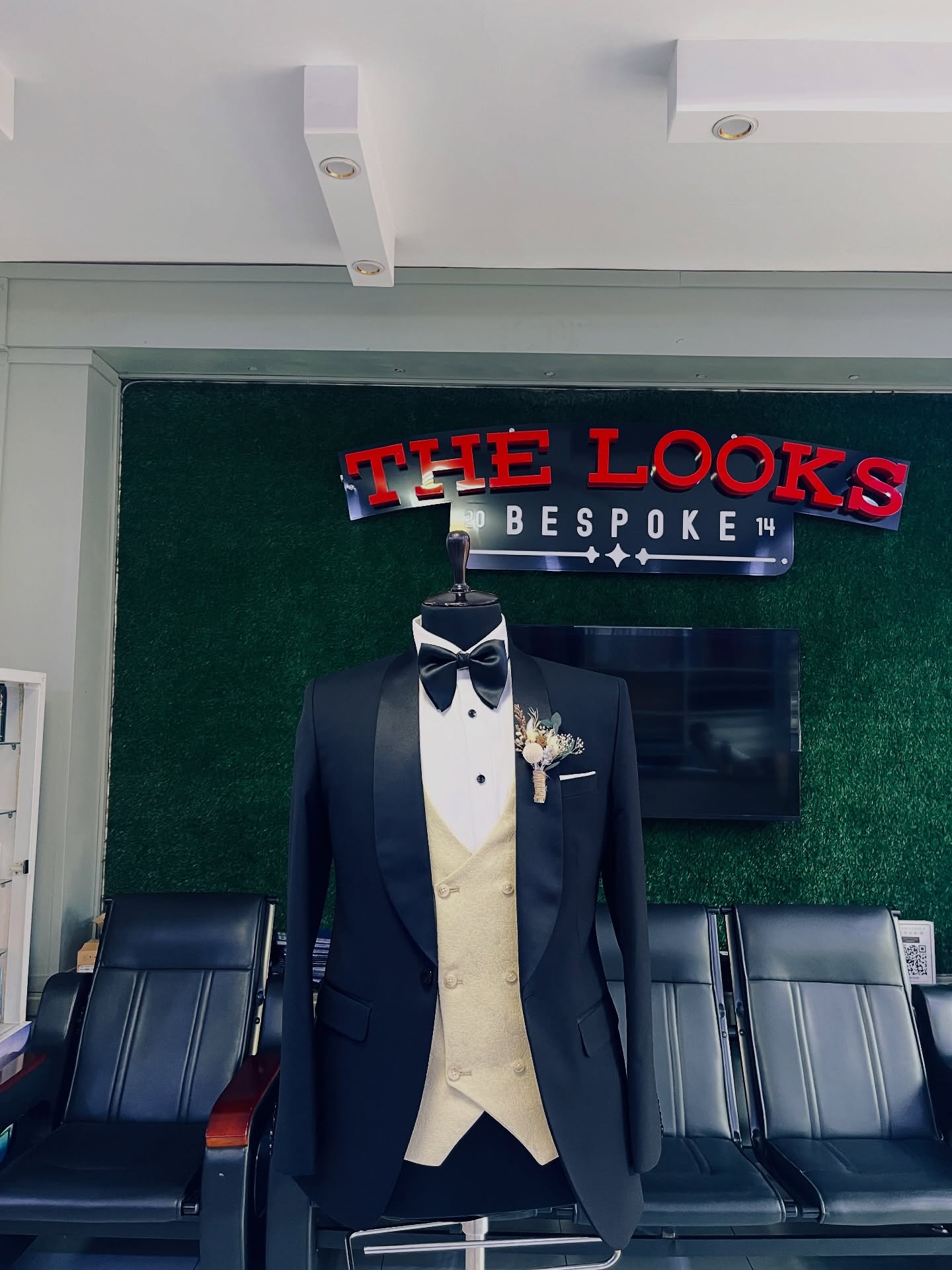 Custom suit fabrics and finishes on display in Kampala (showroom look 19)