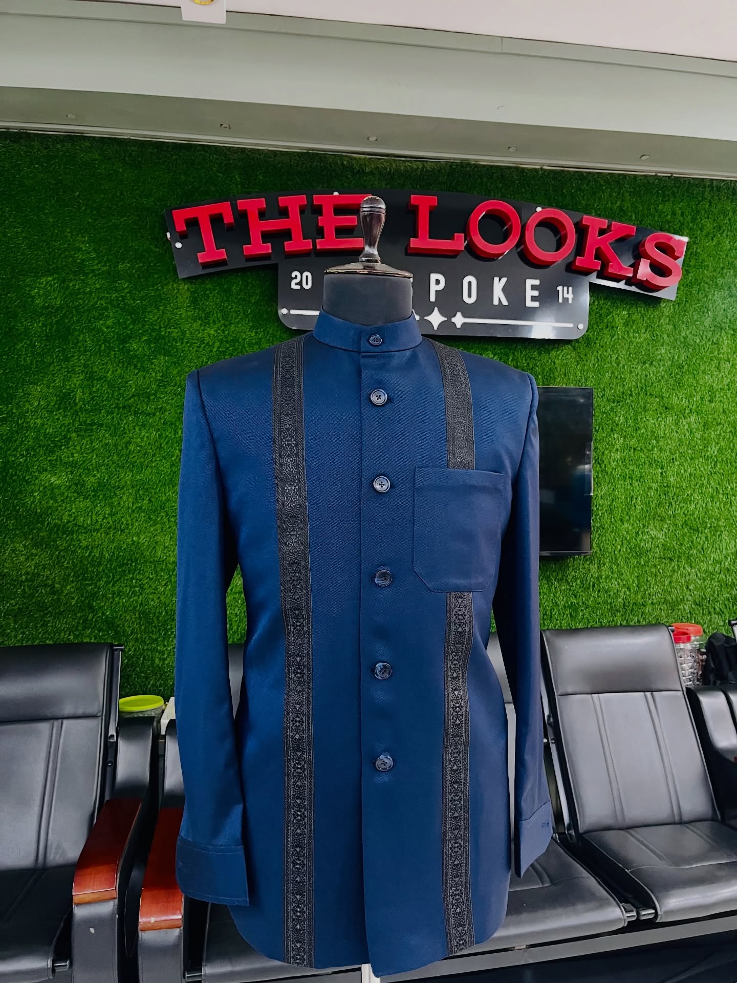 Custom suit fabrics and finishes on display in Kampala (showroom look 34)
