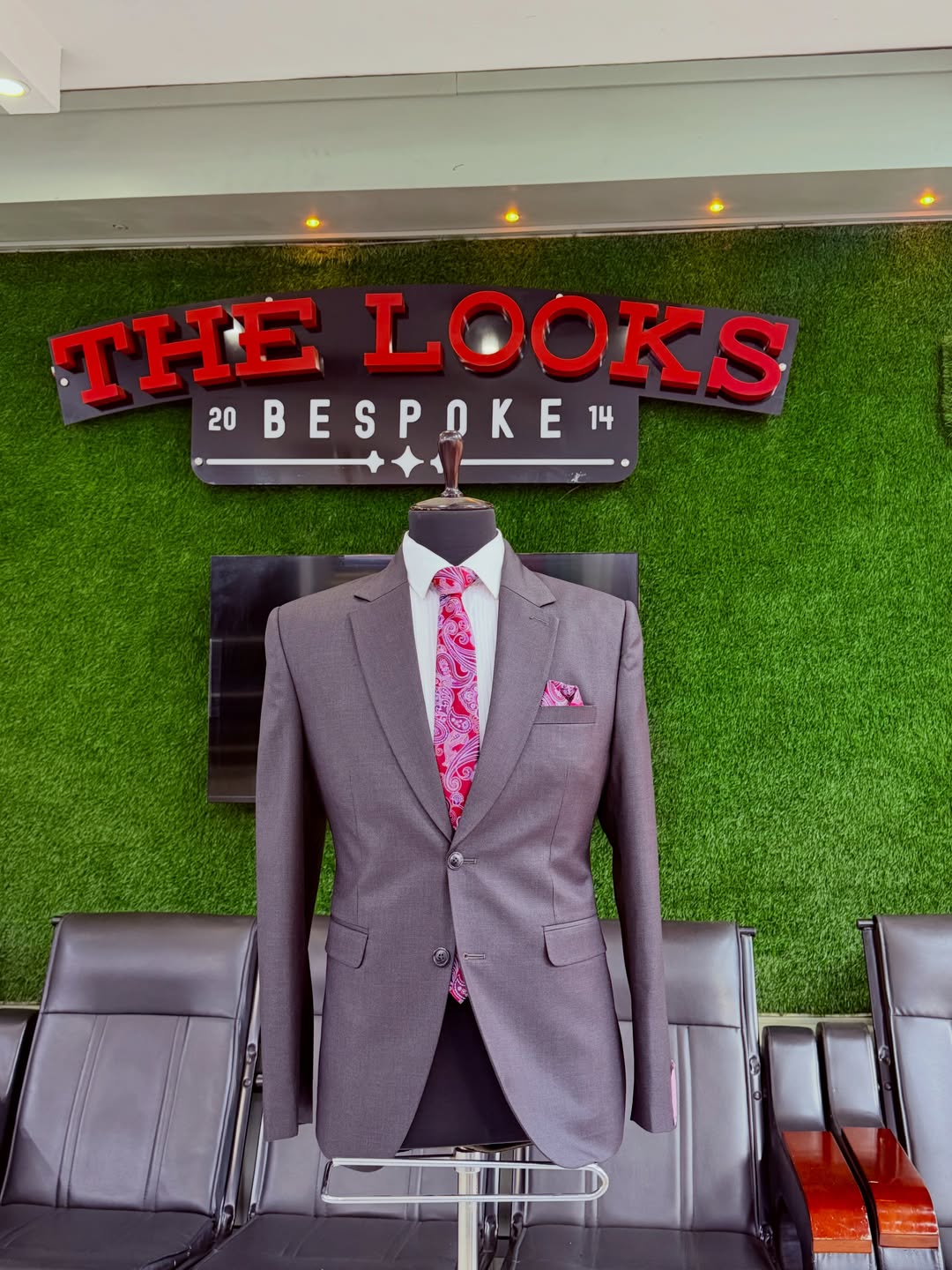 Custom suit fabrics and finishes on display in Kampala (showroom look 59)
