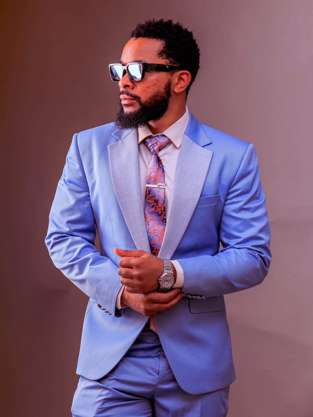 Custom-fitted tuxedo with hand-finished lapels (suits look 10)