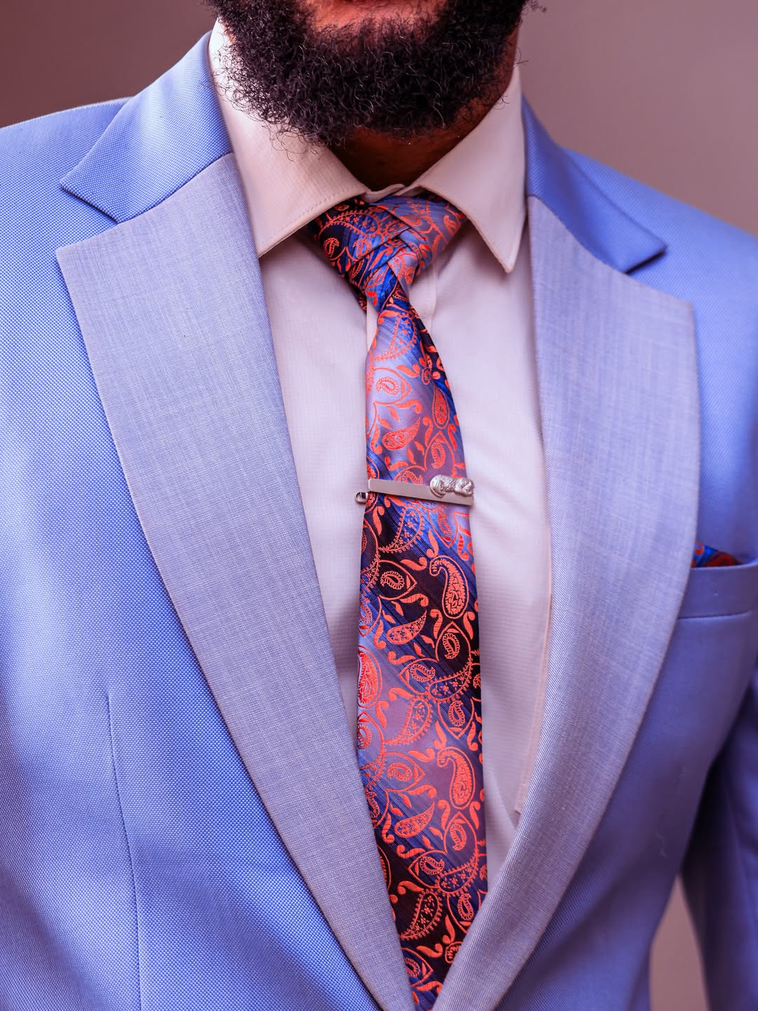 Custom-fitted tuxedo with hand-finished lapels (suits look 17)