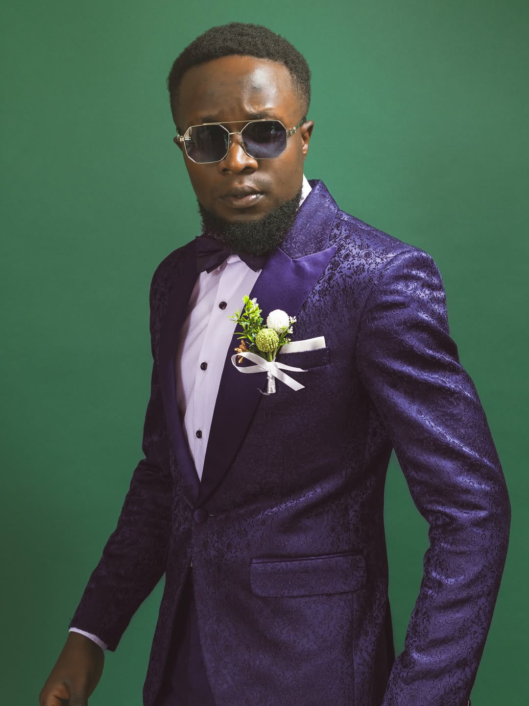 Custom suit with a sharp, structured shoulder (suits look 6)