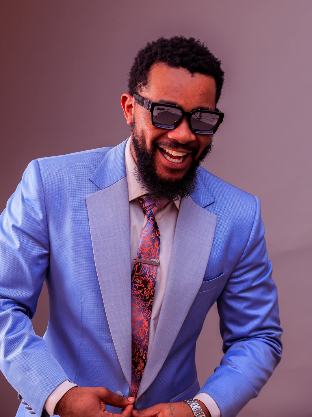 Gentleman in a tailored light-blue suit by The Looks Bespoke