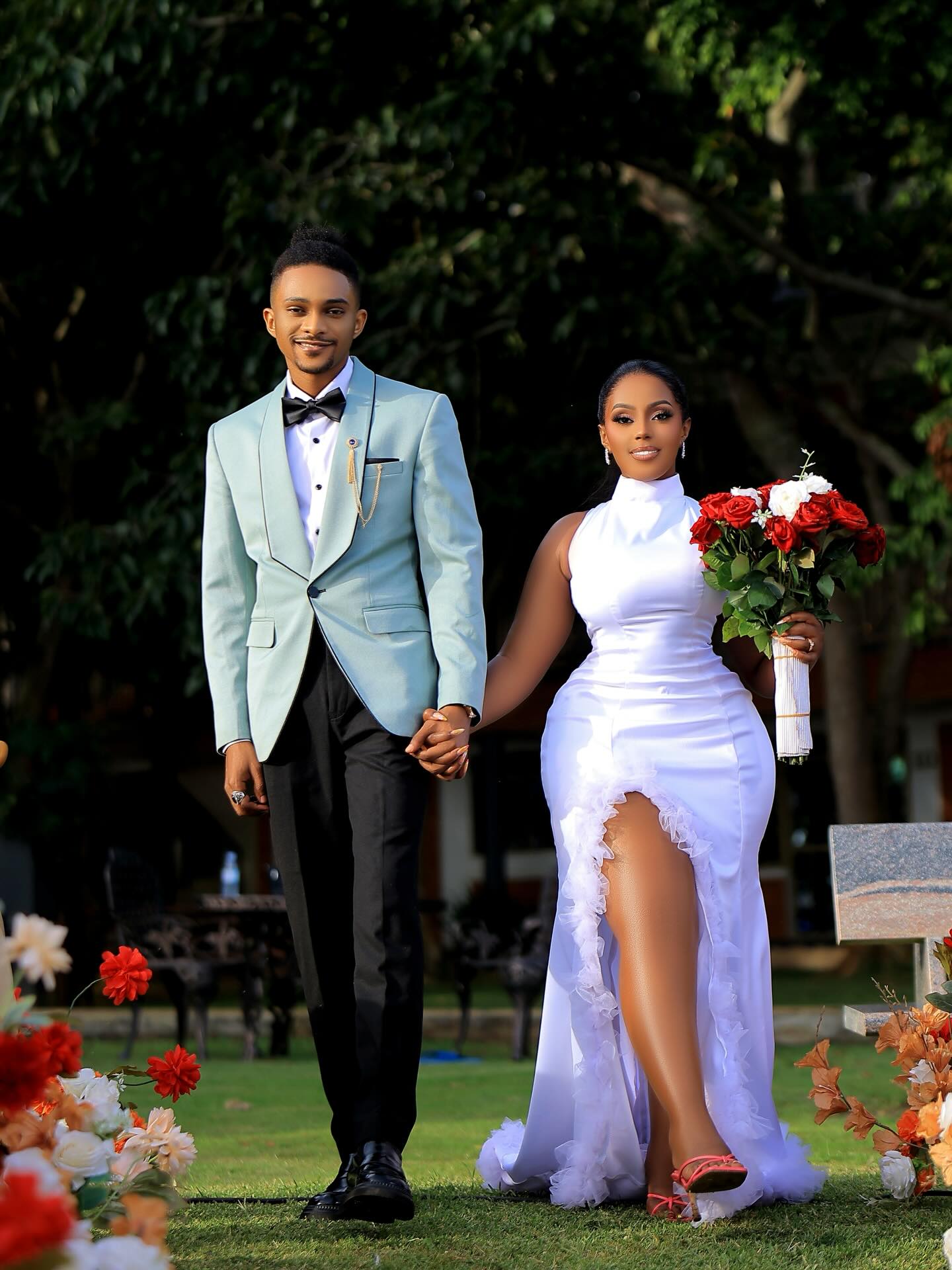 Wedding-day suit hand-finished in Nsambya (weddings look 120)