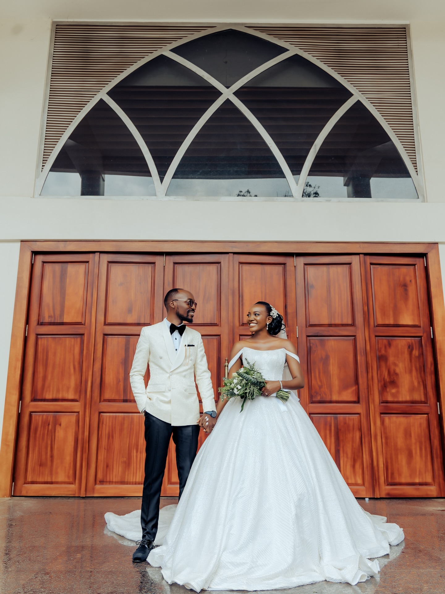 Wedding-day suit hand-finished in Nsambya (weddings look 36)