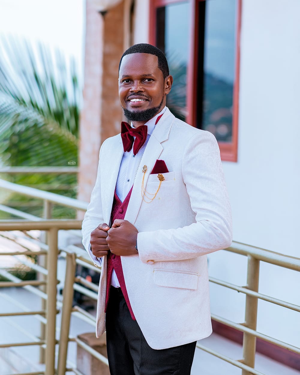Wedding-day suit hand-finished in Nsambya (weddings look 6)